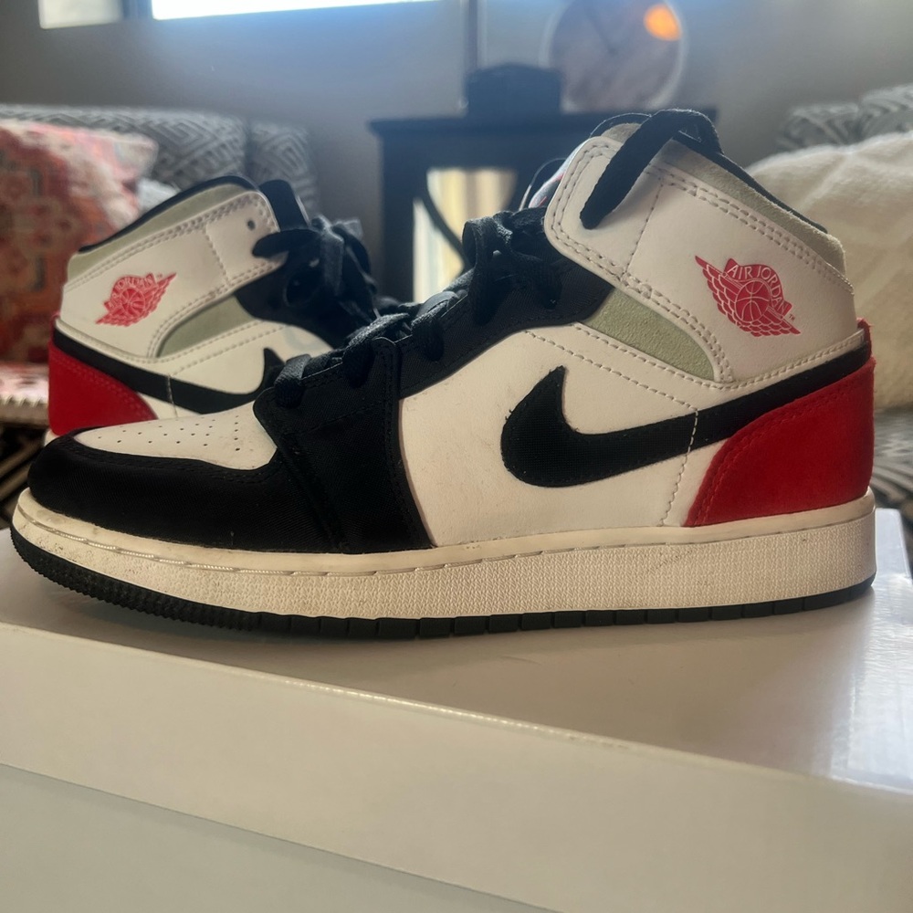 Nike Red and Black Sneakers with High-Top Design